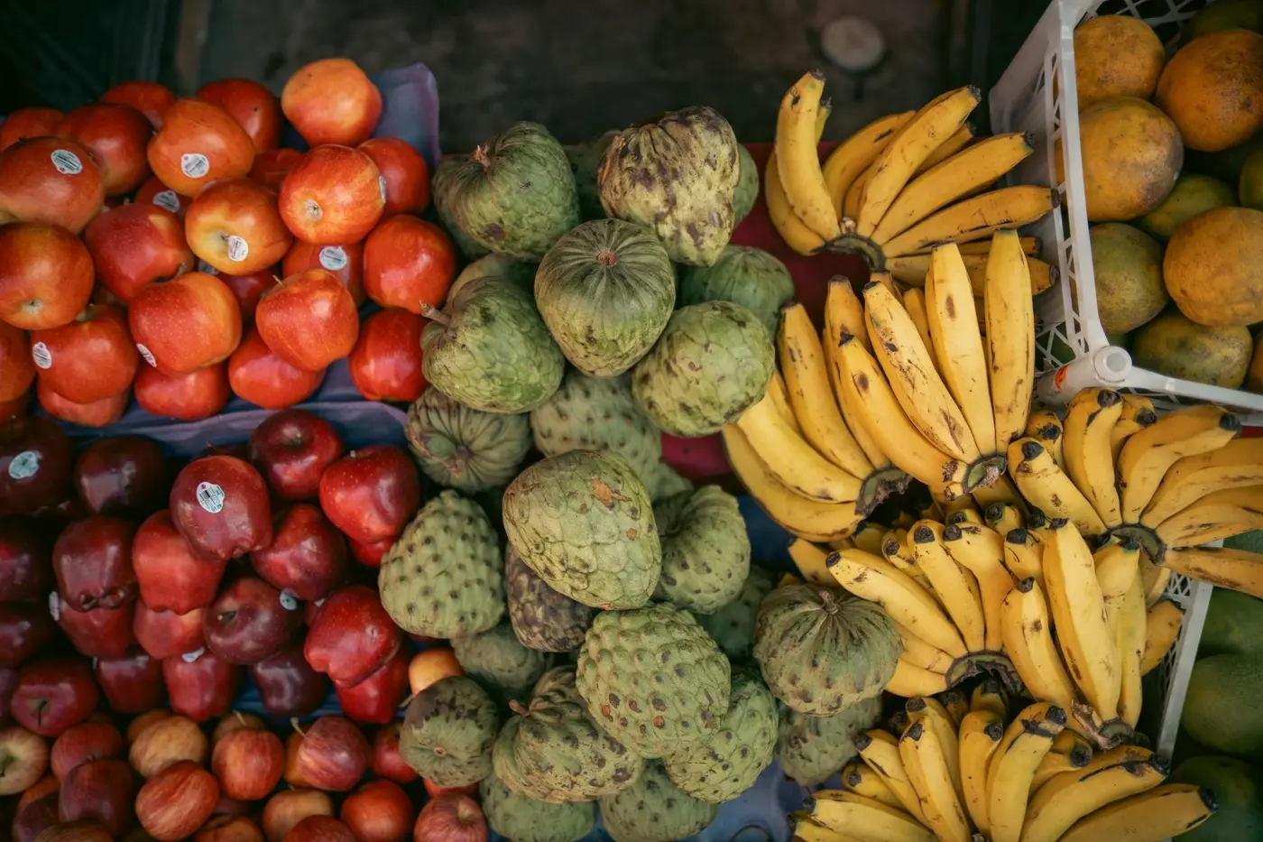 Stacked fruit and produce at a local market