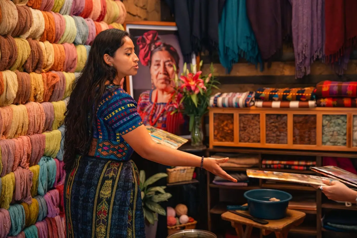 Weaver working at a market stall in Guatemala