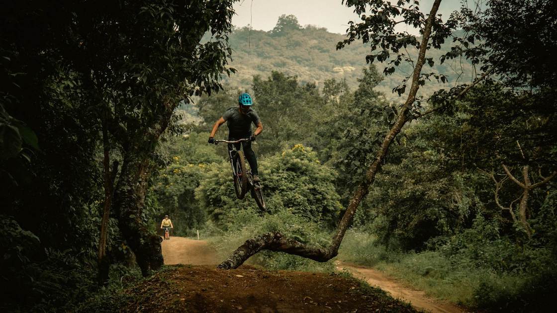 Jason Gainey, the MTB Wizard, jumping his bike in Guatemala's best bike park